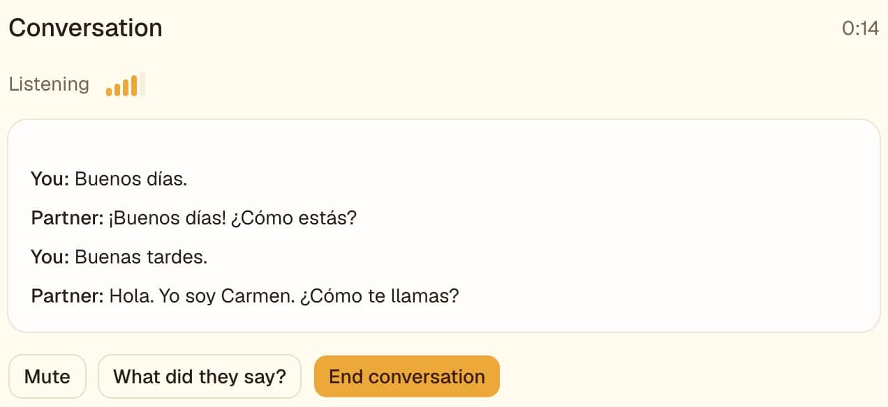 A live conversation in the app: the microphone meter shows the learner being heard while the buddy's spoken Spanish appears as text beneath it.